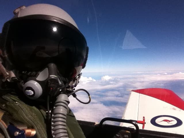 View from military aircraft cockpit in flight