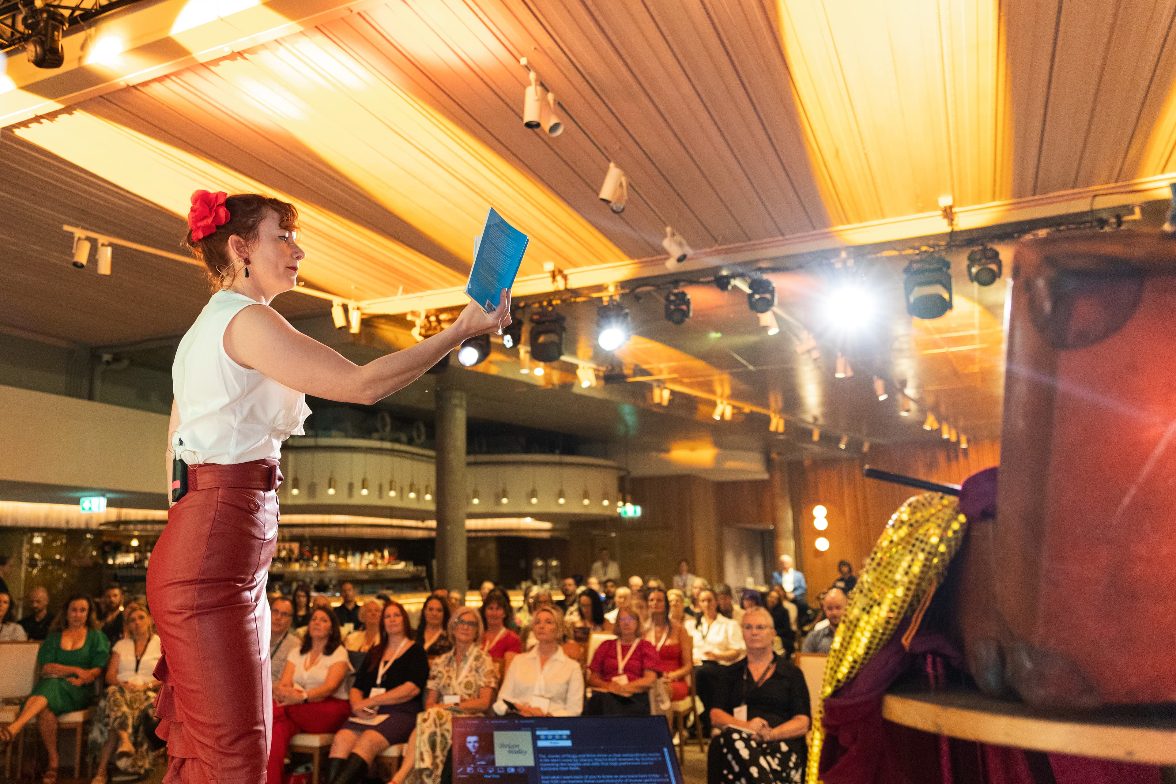 Belinda Beatty presenting to a conference audience