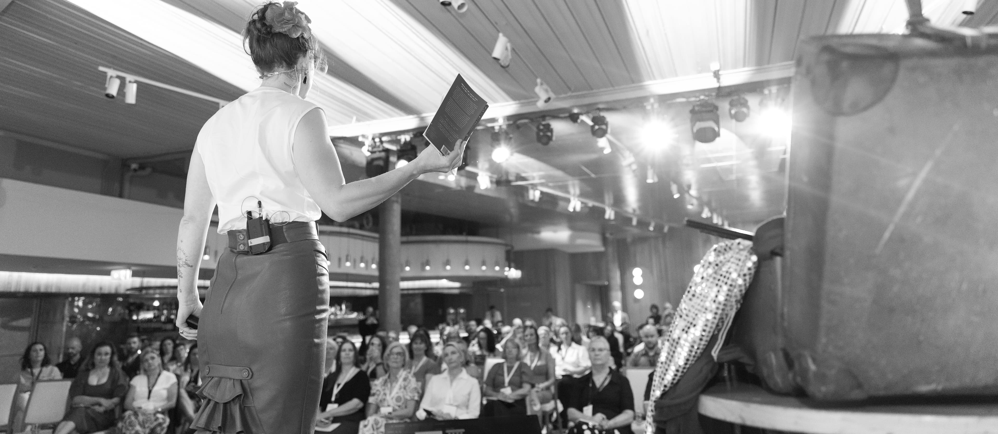 Belinda Beatty speaking to a conference audience
